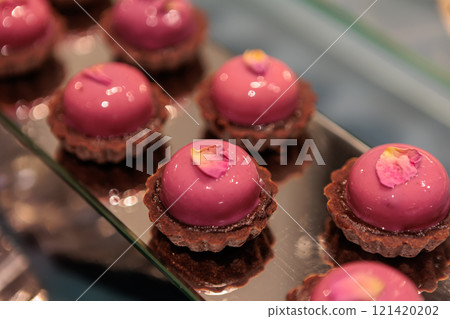 Elegant mousse cakes with a creamy filling Elegant mousse cakes with a creamy filling 121420202