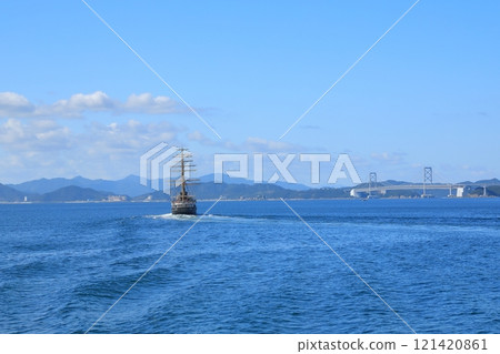 A view of a sightseeing boat heading towards the Onaruto Bridge through the Naruto Strait A view of a sightseeing boat heading towards the Onaruto Bridge through the Naruto Strait 121420861