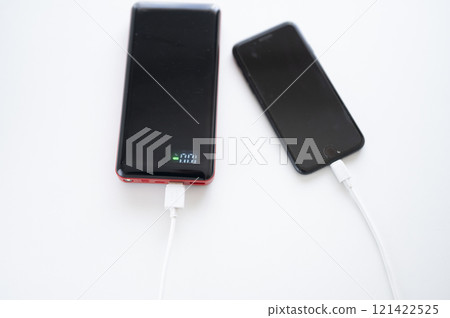 Charge your smartphone with a mobile battery 121422525