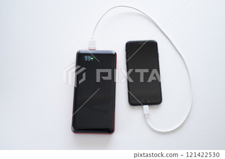 Charge your smartphone with a mobile battery 121422530