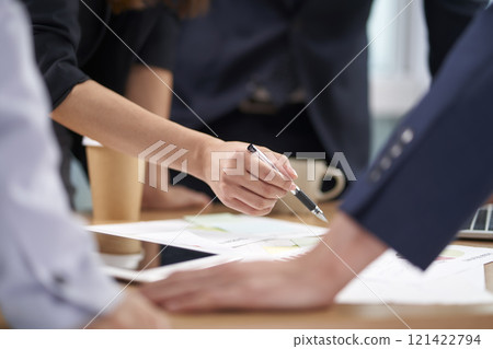 team of asian business people meeting in office 121422794