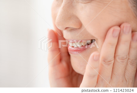Senior woman mouth Senior woman mouth 121423024