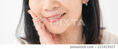 Senior woman mouth 121423027