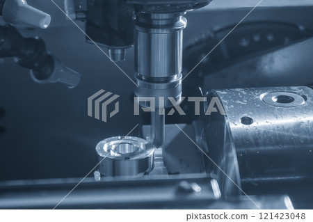 The CNC milling machine chamfer cutting part by chamfer tool in the light blue scene. 121423048
