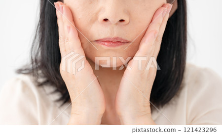Senior woman, sagging cheeks Senior woman, sagging cheeks 121423296