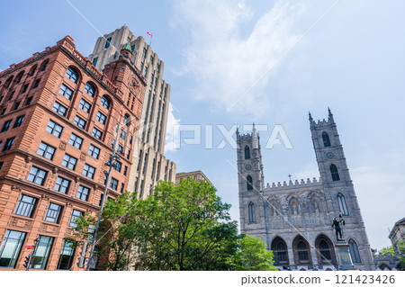 Place d'Armes in Old Montreal. Notre-Dame Basilica, Aldred Building, New York Life Insurance Building. Montreal, Quebec, Canada. 121423426