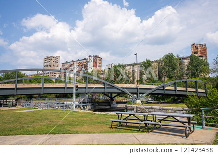 Montreal, Quebec, Canada - August 5 2021 : Lachine Canal National Historic Site in Old Port of Montreal. Silo No.5 in the background. 121423438