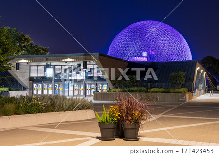 Montreal, Quebec, Canada - August 5 2021 : Montreal Biosphere illuminated at night. Jean-Drapeau Metro station. Jean-Drapeau park, Saint Helens Island. Montreal, Quebec, Canada - August 5 2021 : Montreal Biosphere illuminated at night. Jean-Drapeau Metro station. Jean-Drapeau park, Saint Helens Island. 121423453