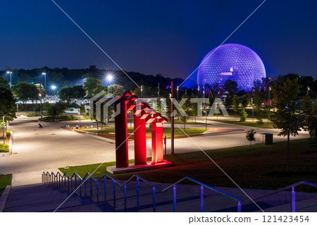 Montreal, Quebec, Canada - August 5 2021 : Montreal Biosphere illuminated at night. Jean-Drapeau Metro station. Jean-Drapeau park, Saint Helens Island. Montreal, Quebec, Canada - August 5 2021 : Montreal Biosphere illuminated at night. Jean-Drapeau Metro station. Jean-Drapeau park, Saint Helens Island. 121423454
