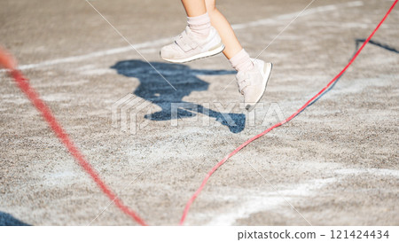 Little child jumping rope silhouette 121424434