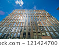 Facade of a modern residential building, building texture 121424700