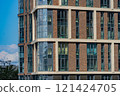 Facade of a modern residential building, building texture 121424705