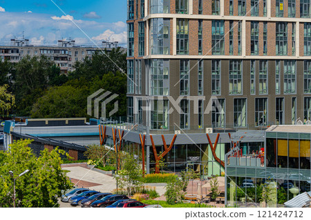 Facade of a modern residential building, building texture 121424712