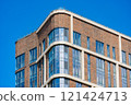 Facade of a modern residential building, building texture 121424713
