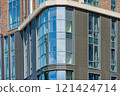 Facade of a modern residential building, building texture 121424714