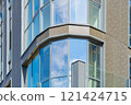 Facade of a modern residential building, building texture 121424715