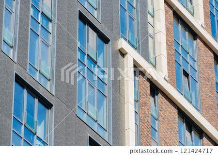 Facade of a modern residential building, building texture Facade of a modern residential building, building texture 121424717