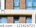 Facade of a modern residential building, building texture 121424721