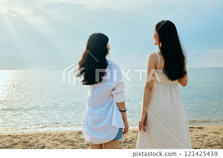 Woman looking at the summer sea 121425439