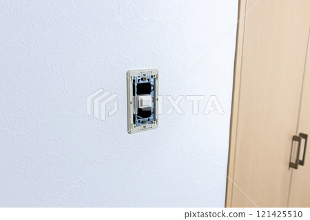 A light switch in a room with the cover removed A light switch in a room with the cover removed 121425510