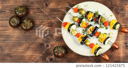 Grilled skewers vegetables on plate. Grilled skewers vegetables on plate. 121425875