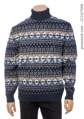Nordic patterned blue and white turtleneck sweater displayed on a mannequin Nordic patterned blue and white turtleneck sweater displayed on a mannequin 121427006