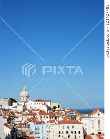 Beautiful streetscape and blue sky of Alfama, Lisbon, Portugal 121427485