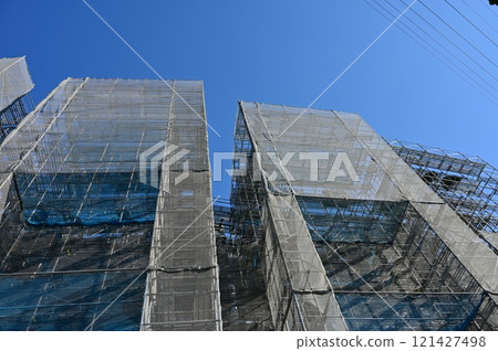 Construction site scaffolding and covering Construction site scaffolding and covering 121427498