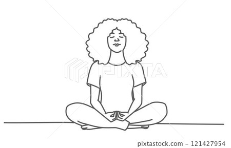 Woman is sitting cross legged on the floor with her hands on her knees 121427954