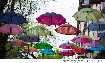 Colorful Umbrellas Hanging Outdoors in Spring 121430844