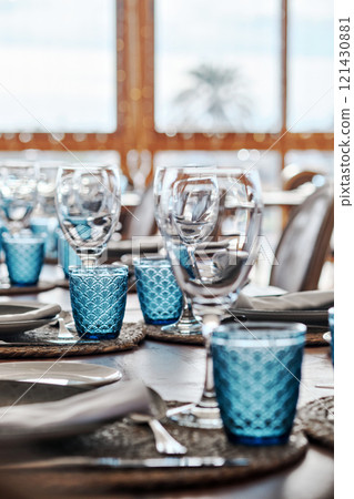 Beautifully set dining table arrangement Beautifully set dining table arrangement 121430881