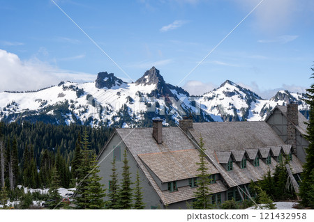 Paradise Inn Framed by Majestic Snow-Capped Peaks and Lush Alpine Forest. 121432958