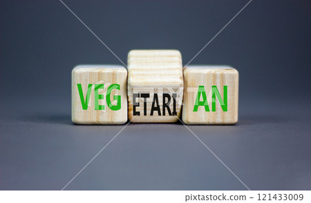 Vegetarian or vegan symbol. Concept words Vegetarian Vegan on wooden block. Beautiful grey table grey background. Healthy lifestyle vegetarian or vegan concept. Copy space. Vegetarian or vegan symbol. Concept words Vegetarian Vegan on wooden block. Beautiful grey table grey background. Healthy lifestyle vegetarian or vegan concept. Copy space. 121433009