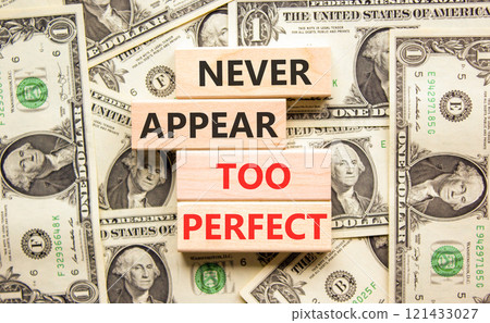 Never appear too perfect symbol. Concept words Never appear too perfect on beautiful wooden blocks. Beautiful background from dollar bills. Business and never appear too perfect concept. Copy space. Never appear too perfect symbol. Concept words Never appear too perfect on beautiful wooden blocks. Beautiful background from dollar bills. Business and never appear too perfect concept. Copy space. 121433027