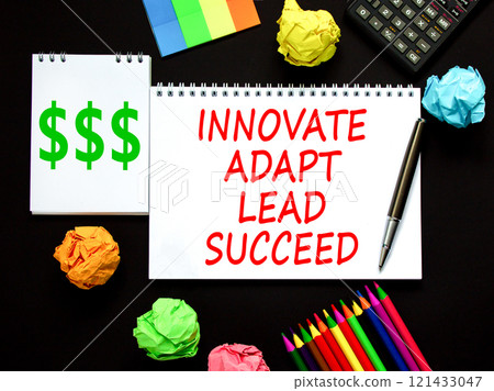 Innovate adapt lead succeed symbol. Concept words Innovate Adapt Lead Succeed on beautiful note. Beautiful black background. Pen. Calculator. Business innovate adapt lead succeed concept. Copy space 121433047