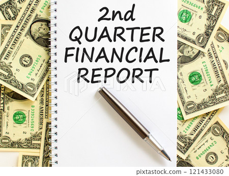 2nd quarter financial report symbol. Concept words 2nd quarter financial report on beautiful white note. Beautiful dollar background. Business 2nd quarter financial report concept. Copy space. 2nd quarter financial report symbol. Concept words 2nd quarter financial report on beautiful white note. Beautiful dollar background. Business 2nd quarter financial report concept. Copy space. 121433080