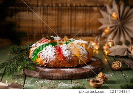 A festive King Cake adorned with colorful candied fruits A festive King Cake adorned with colorful candied fruits 121434584
