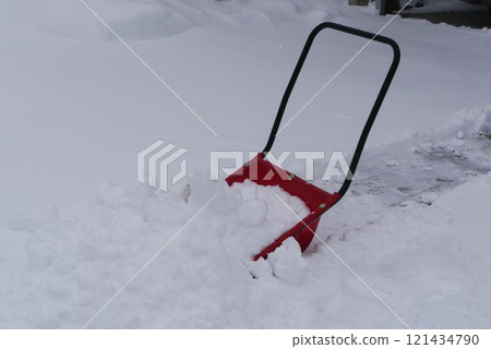 It's snow season. It's cold and sleepy in the morning, and shoveling snow is hard work. But the snow is falling. 121434790