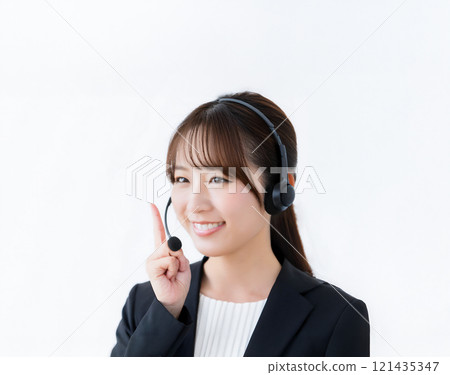 Female operator working at a call center, copy space 121435347