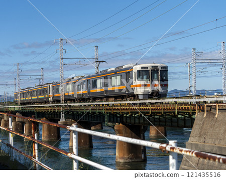A train crossing the iron bridge at Bentenjima, Lake Hamana A train crossing the iron bridge at Bentenjima, Lake Hamana 121435516