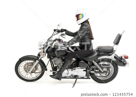 Biker girl riding a bike 121435754