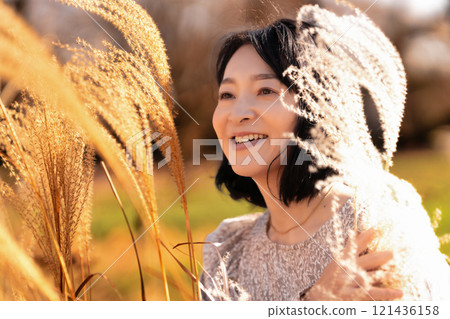 Japanese silver grass and middle-aged woman 121436158