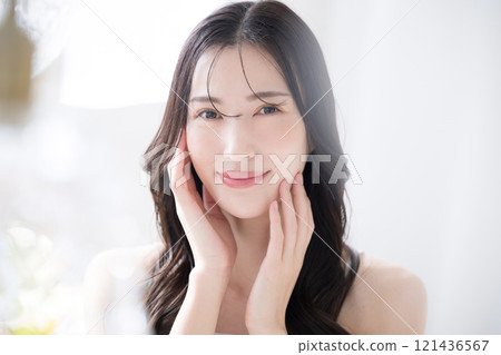 Beautiful young woman with beautiful bare skin, beauty image, close up, looking at camera Beautiful young woman with beautiful bare skin, beauty image, close up, looking at camera 121436567