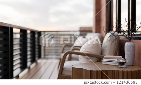 A wooden side table on a contemporary apartment balcony relaxation space with a city view. 121436585