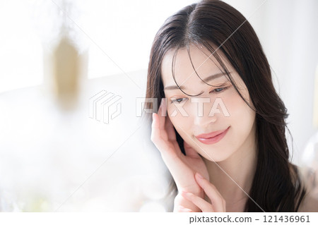 A close-up beauty image of a beautiful young woman with beautiful bare skin A close-up beauty image of a beautiful young woman with beautiful bare skin 121436961