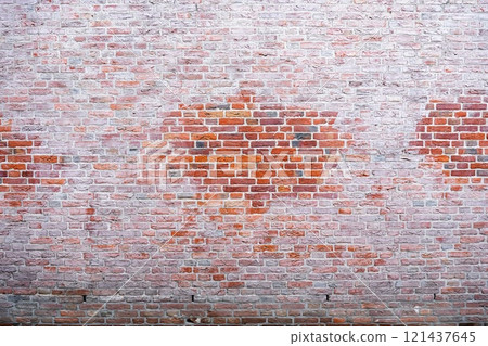 Closeup view of the red wall. Abstract pattern of a brick wall 121437645
