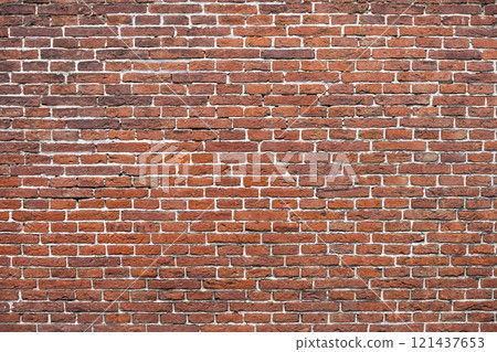 Closeup view of the red wall. Abstract pattern of a brick wall 121437653