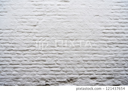 Closeup view of the white wall. Abstract pattern of a brick wall 121437654