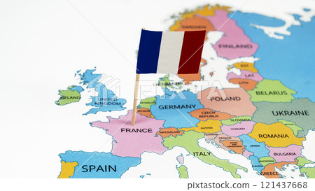 A map of France with the national flag of France on it. The flag is a tricolor featuring three vertical bands colored blue, white, and red A map of France with the national flag of France on it. The flag is a tricolor featuring three vertical bands colored blue, white, and red 121437668