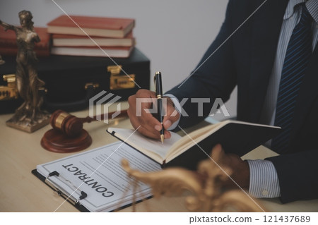 Law theme, gavel or mallet of the judge, lawyer enforcement officers, evidence-based cases taken into account in the court abount business, legislation. Law theme, gavel or mallet of the judge, lawyer enforcement officers, evidence-based cases taken into account in the court abount business, legislation. 121437689